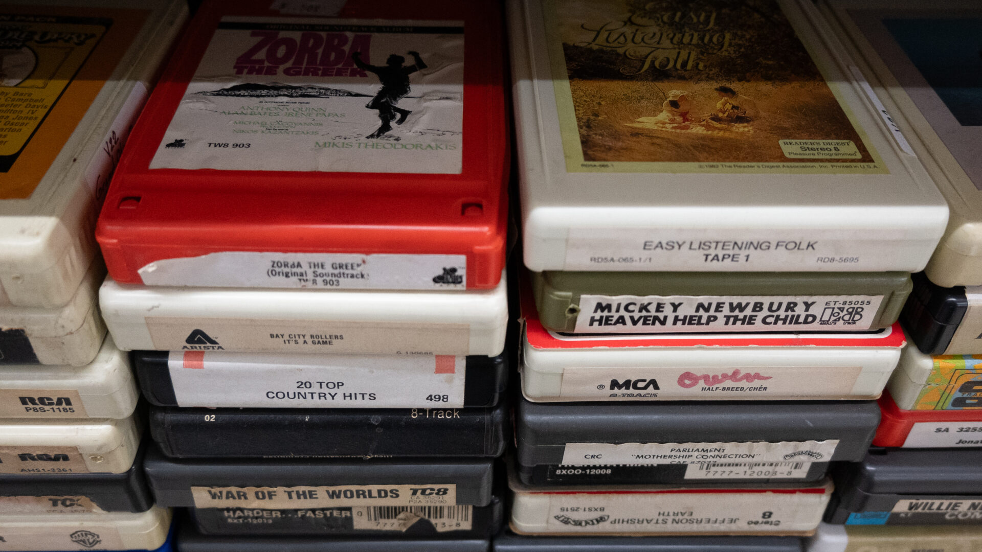 A stack of various tapes on top of each other.