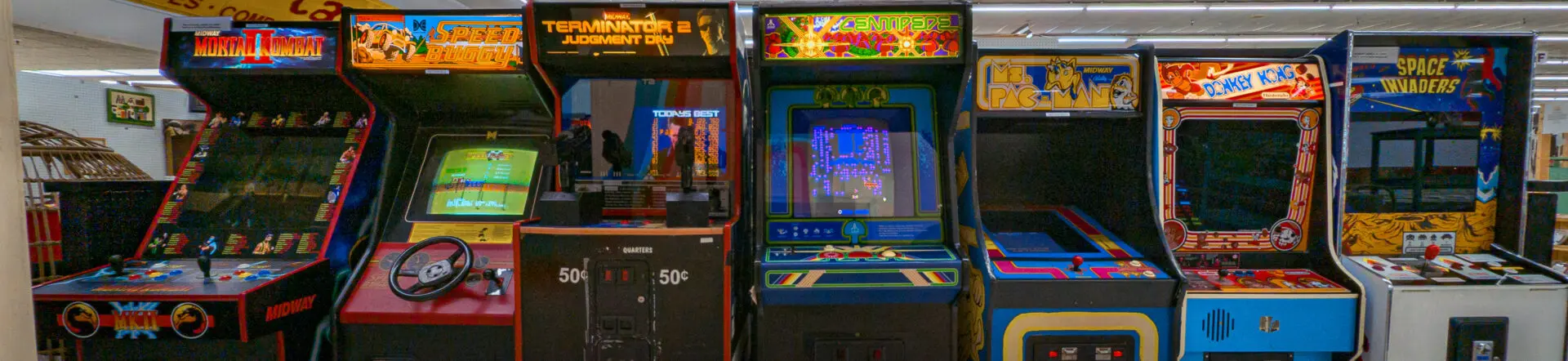 A video game machine is shown in front of another.